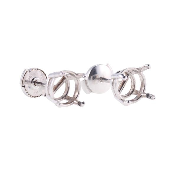 Blue Nile Platinum Stud Earrings Mounting: METAL: Platinum. MEASUREMENTS: Each earrings setting will fit approx. 6.5-7.5mm stone. MARKED: Maker's logo mark Pt950. WEIGHT: 2.6 grams.Gemstones have not been graded for color and clarity, and