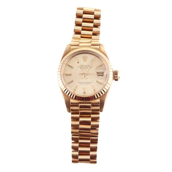 Rolex Datejust 18k Gold Lady's Watch 6917: METAL: 18k Gold. MEASUREMENTS: Case 26mm, 18k gold jubilee band will fit approx. 6.5" wrist, with minor to medium stretching. Gold dial with stick markers. MOVEMENT: Automatic , working order. Re