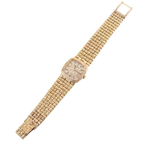 Vacheron Constantin 1970s 18k Gold Basketweave Watch: METAL: 18k Gold. MEASUREMENTS: Case 20mm x 20mm. Basketweave design 18k gold bracelet - 6" long. Gold textured dial with stick markers. MOVEMENT: Manual wind - not working. WEIGHT: 44 grams.Watch