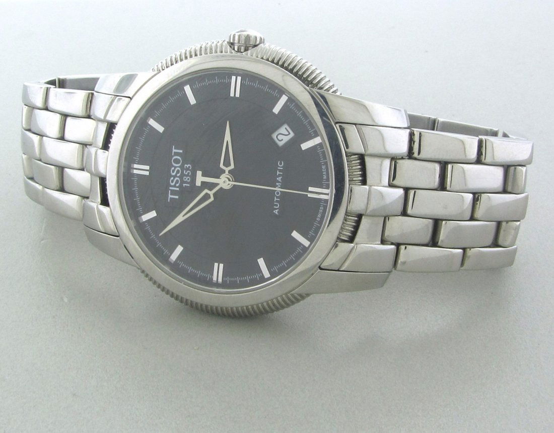 081: TISSOT Mens SS Automatic Day Date Skeleton Back: Stainless steel, case and bracelet , Automatic movement , water-resistant, skeleton Back.