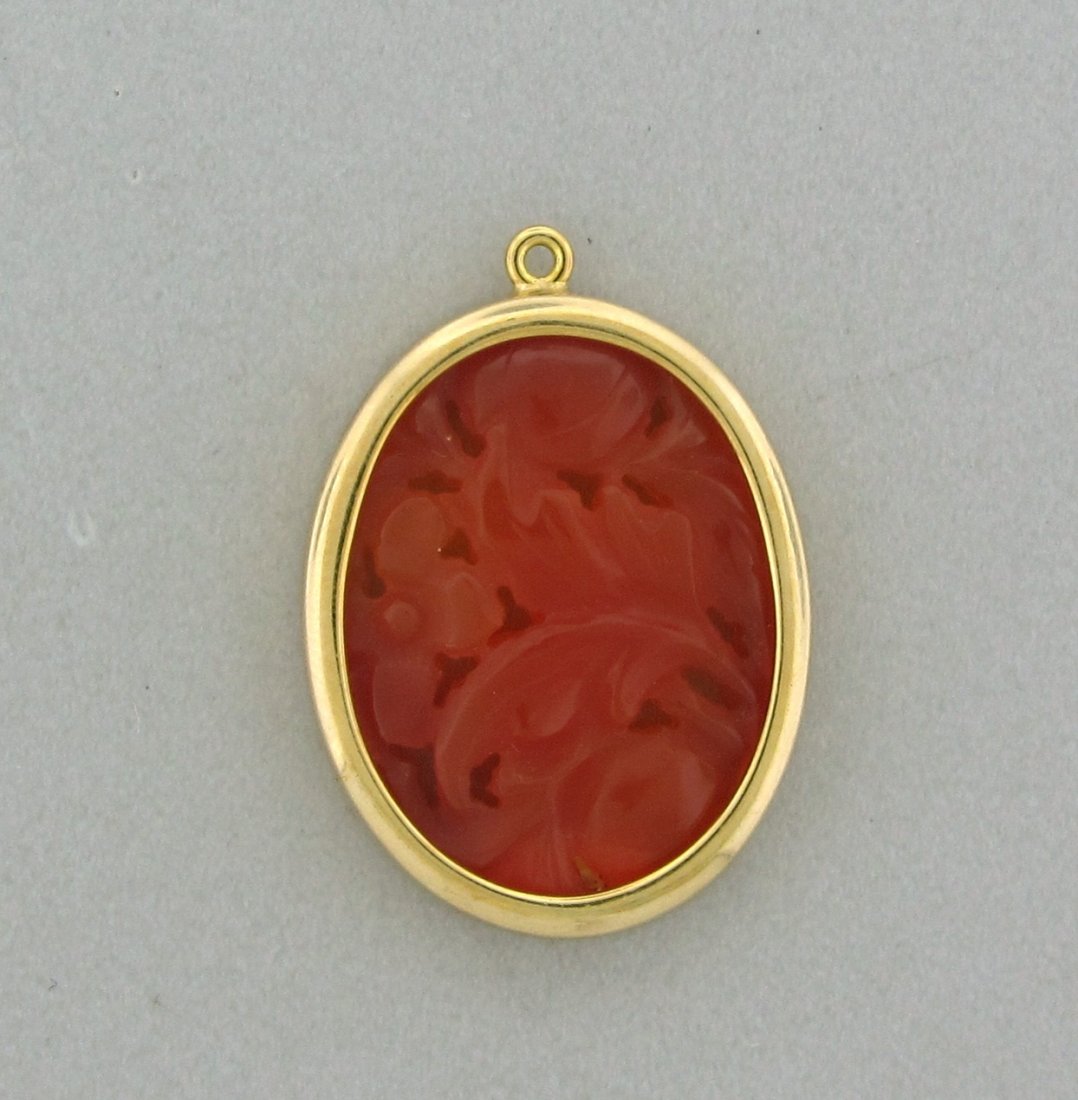 David Webb 18k Gold Carved Carnelian Pendant: Measurements - 29mm x 23mm.Carnelian - 20mm x 26mm. Marks - Webb 18k. weight - 9.2 grams.