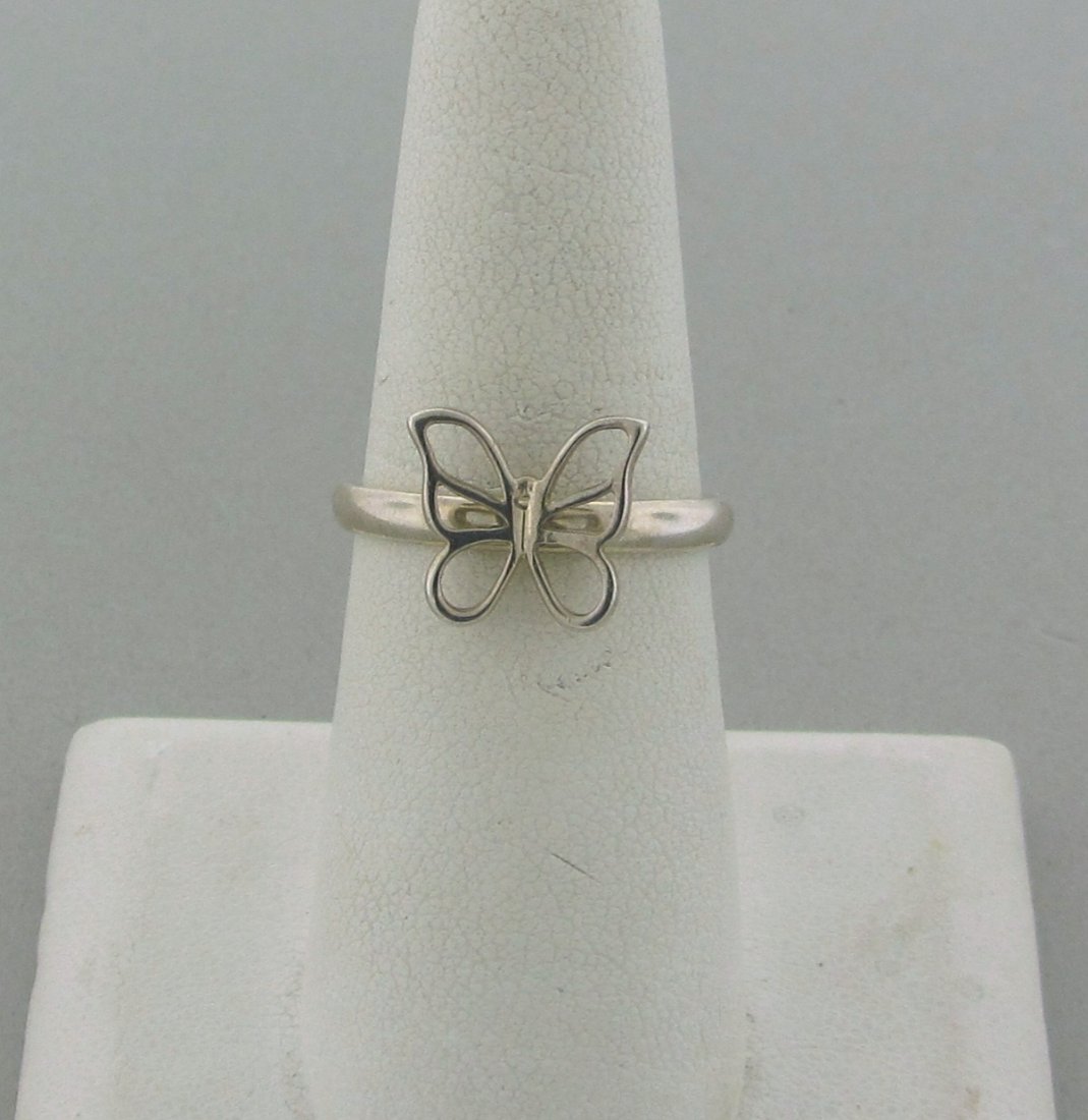 Tiffany & Co Sterling Silver Butterfly Ring: Measurements - ring size 7, butterfly - 11mm x 11mm . marks - T & Co,925. weight - 2.6 grams.