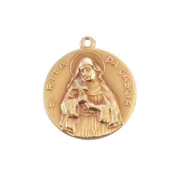 18k Yellow Gold S. Rita Da Cascia Pendant: METAL: 18k Gold. MEASUREMENTS: Pendant is 28mm x 25mm. MARKED: 750 Hallmarks. WEIGHT: 7.6 grams.Gemstones have not been graded for color and clarity, and tested for clarity and color enhancement, unle