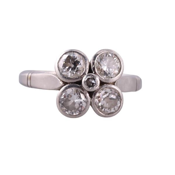 Platinum Diamond Ring: METAL: Platinum. GEMSTONES: Diamonds approx. 0.67ctw. MEASUREMENTS: Ring size 4 1/2, top is 9.3mm. TESTED: Plat. WEIGHT: 4.1 grams.Gemstones have not been graded for color and clarity, and tested for 