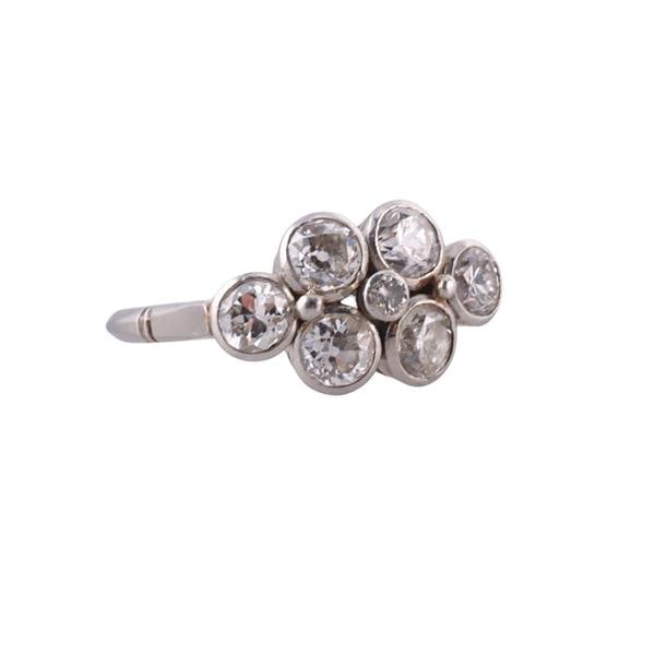 Platinum Diamond Ring: METAL: Platinum. GEMSTONES: Diamonds approx. 1.00ctw. MEASUREMENTS: Ring size 5 1/4, top is 9.6mm. TESTED: Plat. WEIGHT: 4.3 grams.Gemstones have not been graded for color and clarity, and tested for 