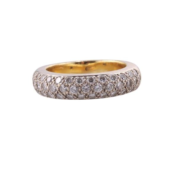 18k Gold Diamond Band Ring: METAL: 18k Gold. GEMSTONES: Diamonds approx. 0.60ctw. MEASUREMENTS: Ring size 4, top is 4.7mm wide. MARKED: 18k Spark. WEIGHT: 6 grams.Gemstones have not been graded for color and clarity, and tested 