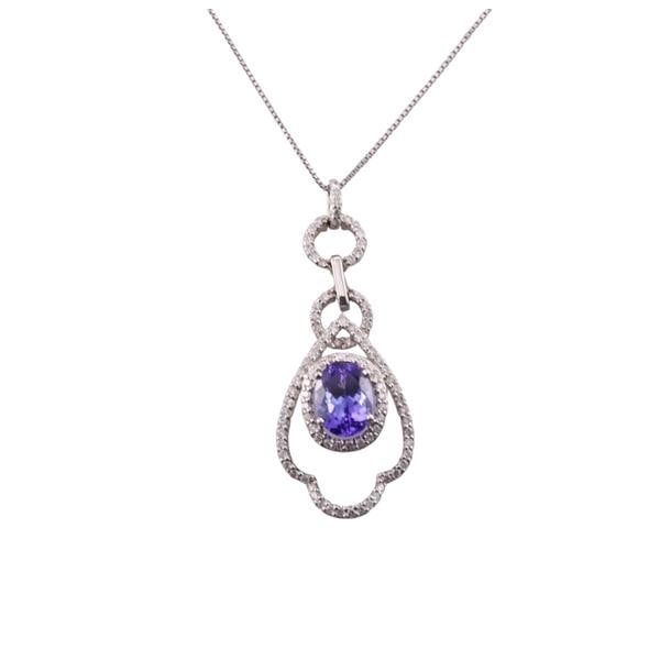 14k Gold Diamond Tanzanite Pendant Necklace: METAL: 14k Gold. MEASUREMENTS: Necklace is 18" long, pendant is 40mm x 16mm. GEMSTONES: Diamonds approx. 0.40ctw, Tanzanite approx. 8.5 x 6.5mm. MARKED: 14k. WEIGHT: 4.8 grams.Gemstones have not 