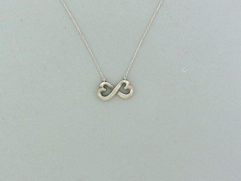 068: Tiffany & Co Sterling Silver Loving Heart Necklace: Measurements - 23" long. pendant - 22mm x 11.5mm. marks - Tiffany & Co,925, Paloma Picasso, weight - 4.4 grams.