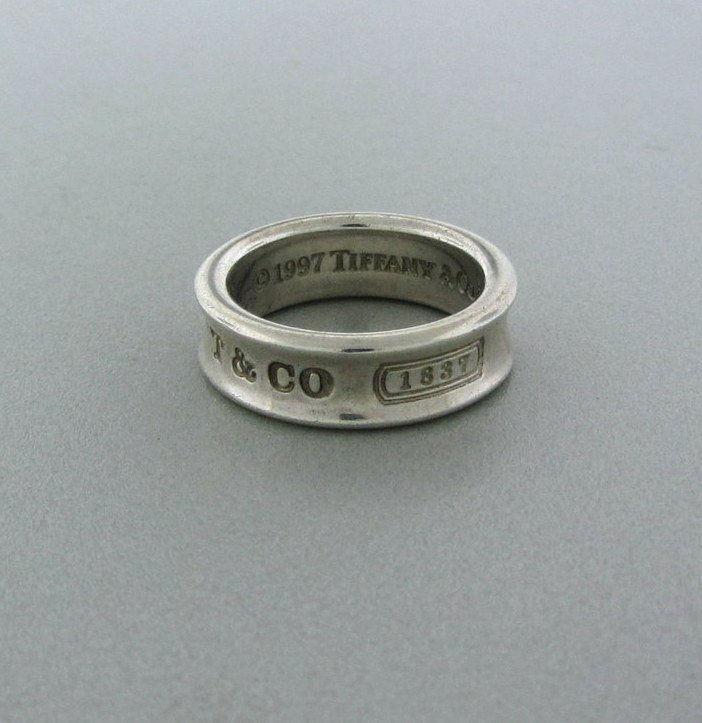 085: Tiffany & Co Sterling 1837 Band Ring: Measurements - ring size - 8, ring is 7mm wide. marks - 1997,Tiffany & Co,925,T & Co,1837. weight - 9.0 grams.