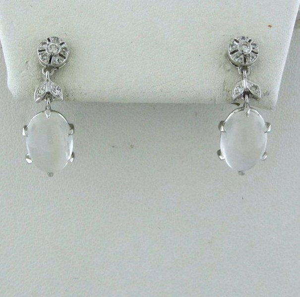 Estate 14k Gold Diamond Moonstone Drop Earrings: Measurements - 22mm x 7.5mm. diamonds - approx. 0.13ctw. moonstone - 7.5mm x 10.5mm. weight - 3.0 grams.