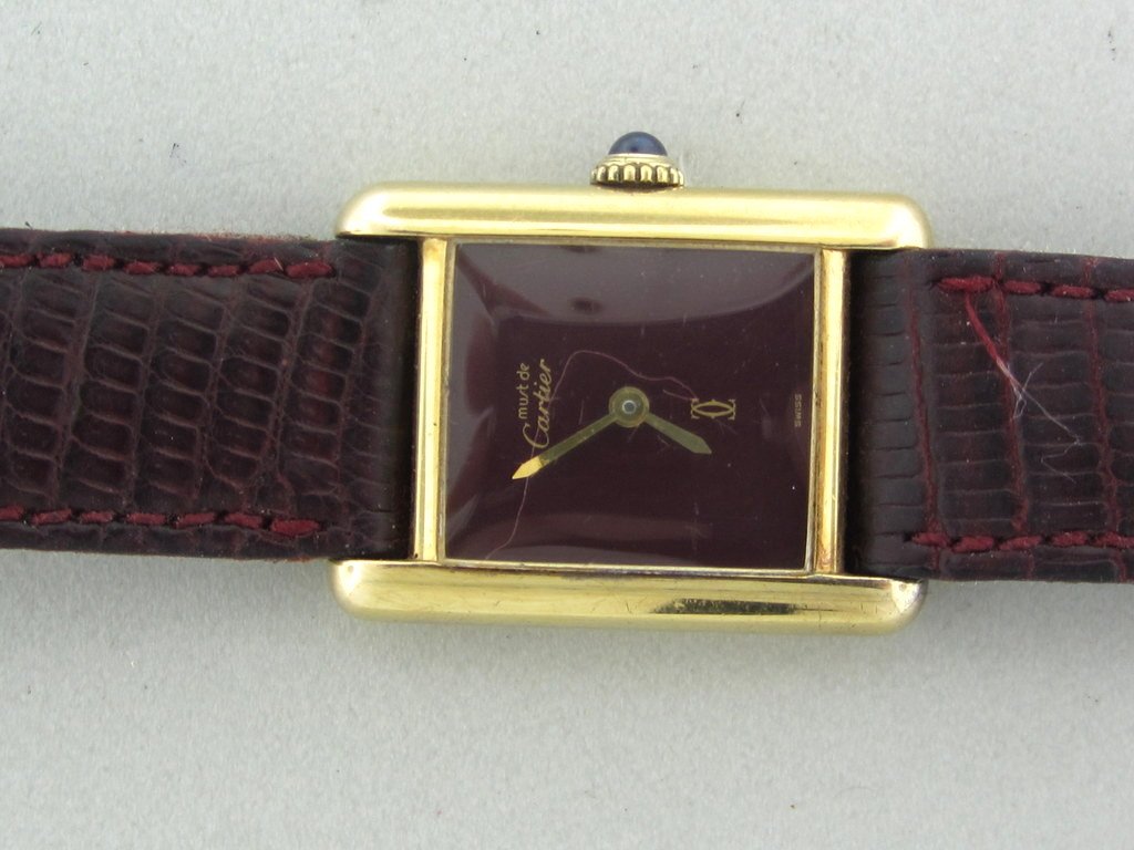 Cartier Tank Watch Manual Watch: LADY'S CARTIER VERMEIL TANK WATCH, ORIGINAL BUCKLE, ORIGINAL BAND , SAPPHIRE CROWN. MANUAL WIND, WORKING ORDER