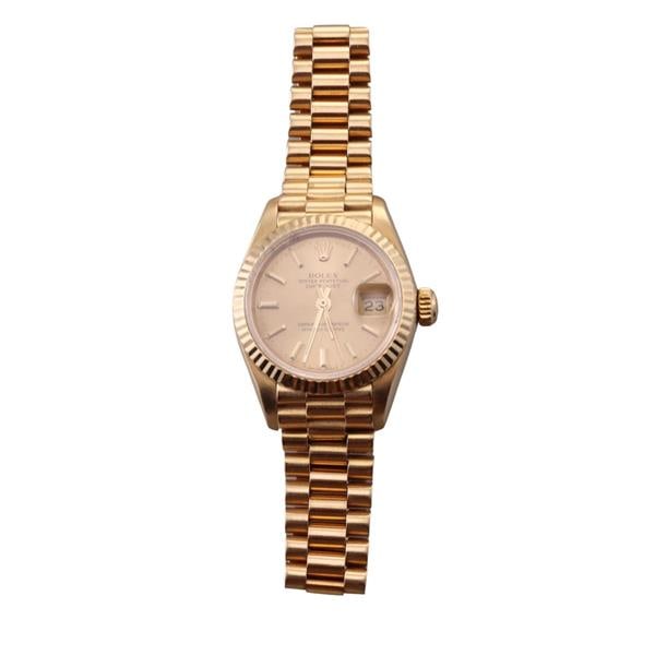 Rolex President 18k Gold Lady's Watch 69178: METAL: 18k Gold. MEASUREMENTS: Case 26mm, president 18k gold bracelet will fit approx. 6.5" wrist max. Gold tone dial with stick markers. MOVEMENT; Automatic, working order. Case back has French
