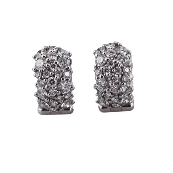 Paul Morelli 18k Gold Diamond Small Huggie Hoop Earrings: METAL: 18k Gold. MEASUREMENTS: Earrings are 12mm in diameter x 5.6mm wide. GEMSTONES: Diamonds approx. 0.60ctw. MARKED: Morelli, 750. WEIGHT: 5 grams.Gemstones have not been graded for color and clari