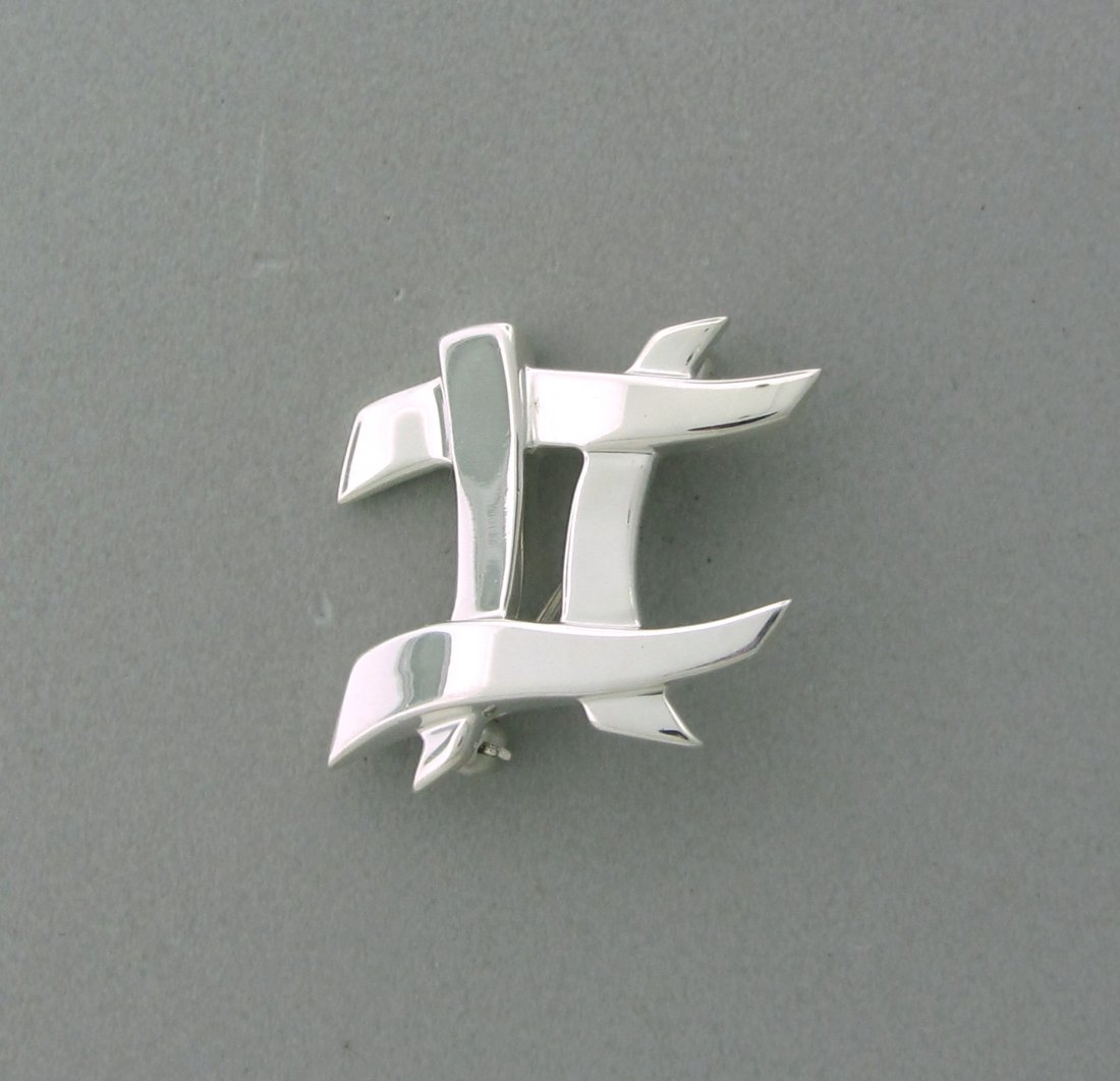 007: Tiffany & Co Paloma Picasso Sterling Brooch Pin: Measurements - 24mm x 26mm. Marks - Tiffany & Co,925,Paloma Picasso. weight - 3.9 grams.