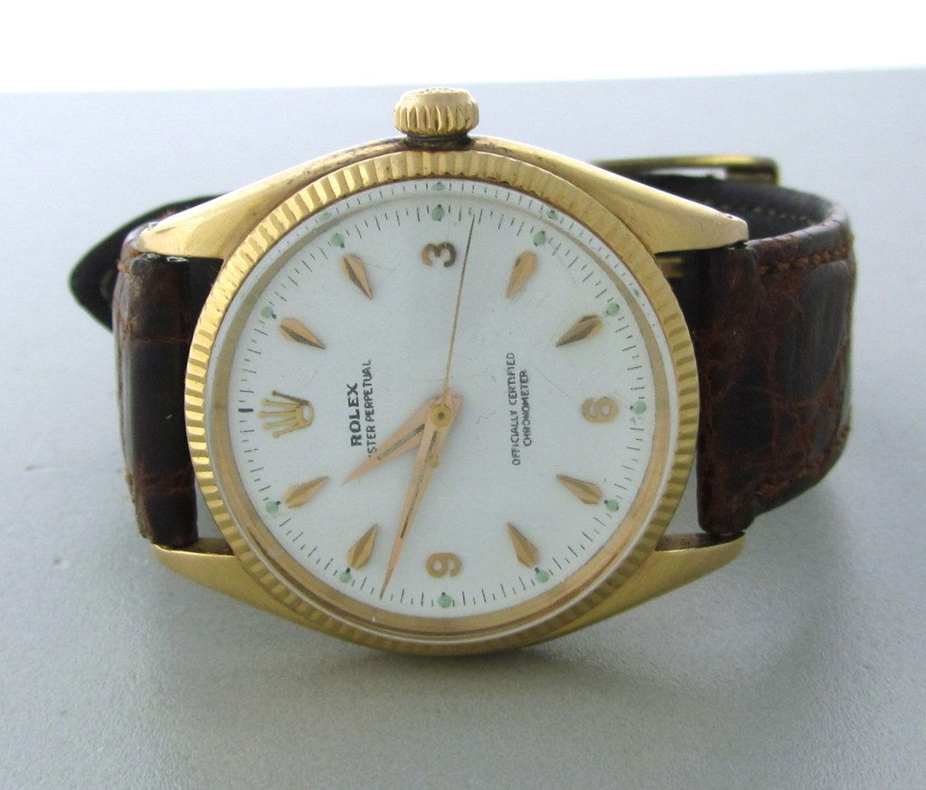 VINTAGE ROLEX OYSTER 18K GOLD WATCH 6567: Ref: 6567 Serial:14#### Manufacturer Rolex Model :Oyster Perpetual 18K Case 32mm X 40mm , white Dial, Movement Automatic Bracelet- N/A, Box -No / Papers - No