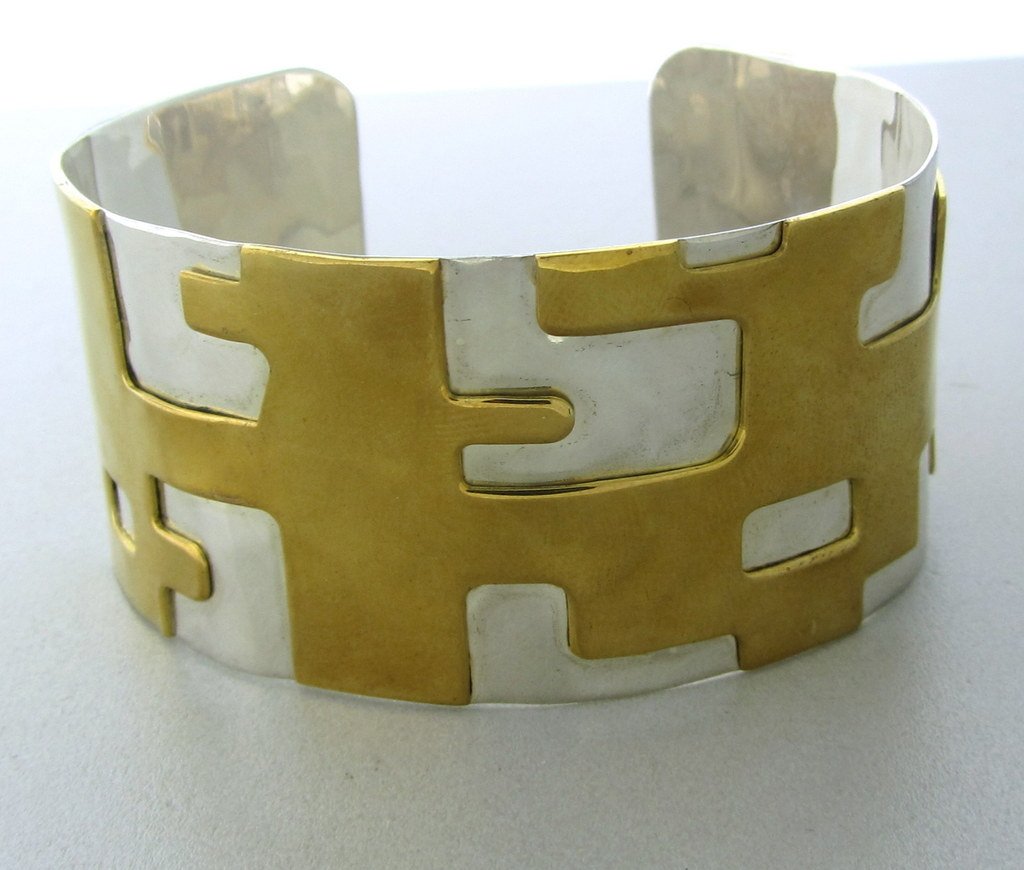 009: Robert Lee Morris Sterling Brass Cuff Bracelet: Measurements - bracelet will fit up to 7" wrist and is 30mm wide. marks - RLM,925,brass,China. weight - 38.2 grams