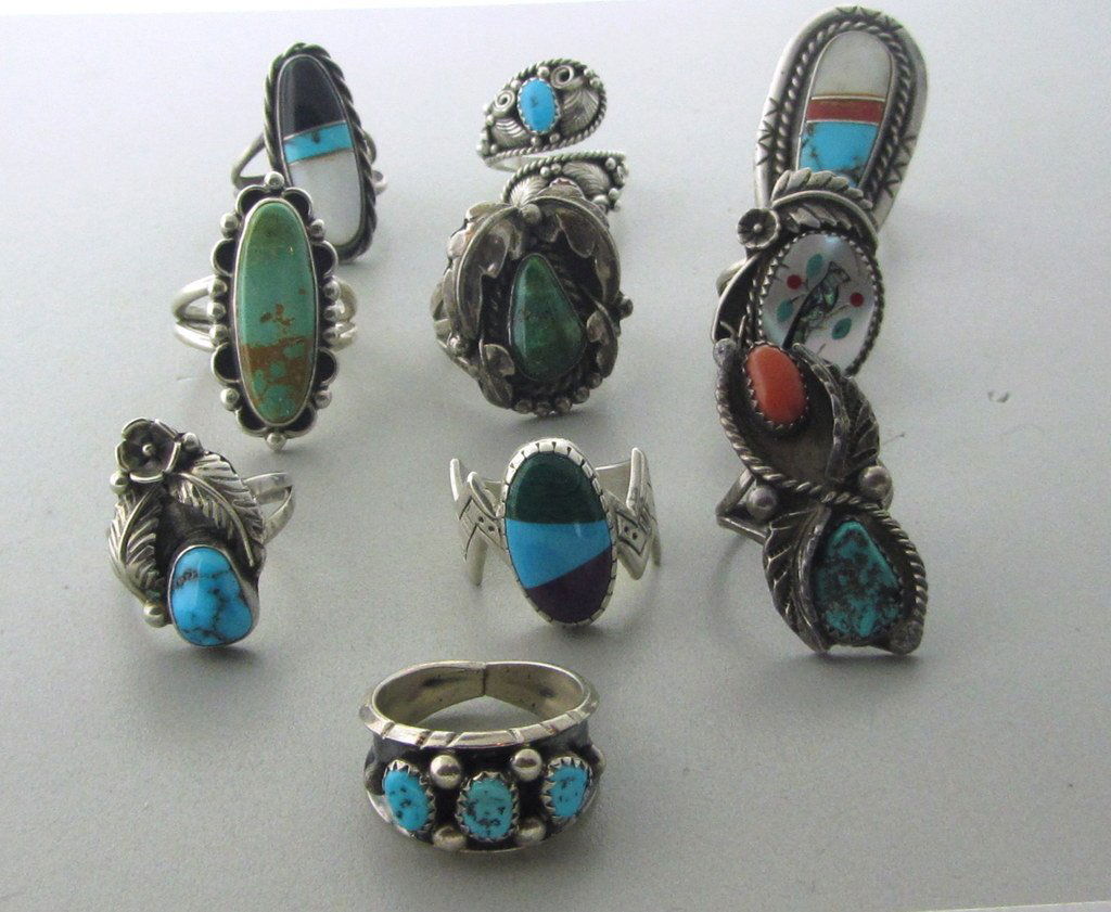 021: Native American Sterling Gemstone Ring Lot of 10: Measurements - rings sizes: 6 1/2, 9, 6 1/2, 7, 7 1/2, 7 1/4, 6, 8, 8, 9. multi colored gemstones - turquoise,coral,mother of pearl,onyx,malachite. weight - 78.8 grams.