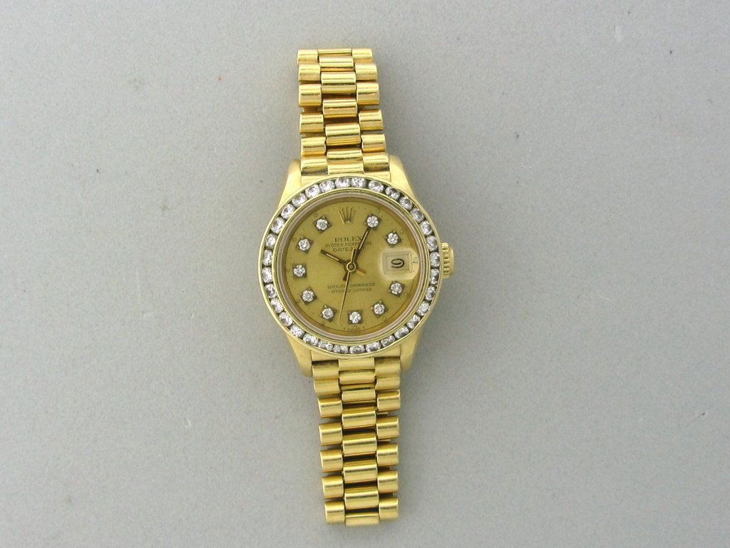 LADY ROLEX PRESIDENT 18K GOLD DIAMOND WATCH: Ref: 69178 Serial:81##### Manufacturer Rolex Model :Oyster Perpetual Datejust, 18K Case 26mm X 33mm , Diamond Dial, Diamond Bezel approx.1.70ctw , 18k gold Bracelet, Movement Automatic , Box -No/Paper