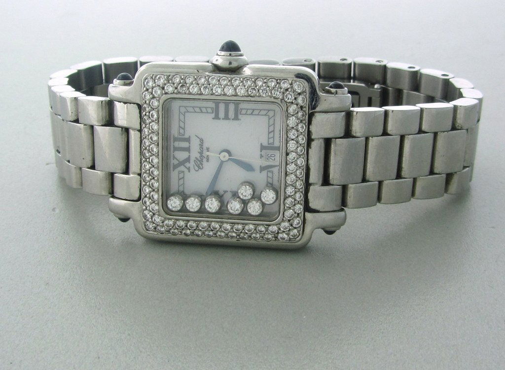 Chopard Happy Sport Diamond Watch: Measurements - 26mm (without crown) x 26mm. Movement quartz. diamonds. crystal sapphire. will fit up to 8" wrist. weight - 88.8