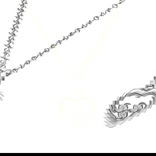 Chopard Happy Diamonds Icons 18k White Gold Diamond Pendant Necklace: METAL: 18k White Gold. GEMSTONES: Diamonds approx. 0.17 ctw. MEASUREMENTS: Necklace length 16 1/2 inches, pendant with bail is 18mm x 13mm. MARKED: Chopard, Au750, Assay Marks, Numbered 6332384