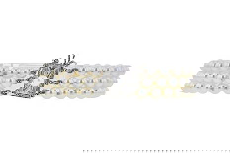 Mikimoto Akoya Pearl Multi Strand Bracelet with 14k White Gold Clasp: METAL: 14k White Gold. GEMSTONES: Akoya pearls measuring approx. 5-5.5mm. MEASUREMENTS: Bracelet length 6 3/4 inches. MARKED: Maker's mark, WG, K14. WEIGHT: 22.8 grams. Comes with box. Gemstones