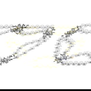 Tiffany & Co. Platinum Pearl and Diamond Bracelet: METAL: Platinum. GEMSTONES: Diamonds approx. 1.15 ctw, Pearls measuring approx. 4-4.5mm. MEASUREMENTS: Length 7 inches, width 8.2mm. MARKED: Tiffany & Co., 1994, PT950. Comes with box. WEIGHT: