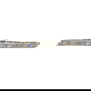 Art Deco Filigree 14k White Gold Diamond and Sapphire Bracelet: METAL: 14k White Gold. GEMSTONES: Diamonds approx. 0.10 ctw, Sapphires. MEASUREMENTS: Length 6 1/4 inches, width 4.7mm. MARKED: 14k. WEIGHT: 10.8 grams. Gemstones have not been graded for color and