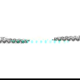 14k White Gold Emerald and Diamond Tennis Bracelet: METAL: 14k White Gold. GEMSTONES: Diamonds approx. 1.96 ctw, Emeralds. MEASUREMENTS: Length 7 1/4 inches, width 5mm. MARKED: 14k. WEIGHT: 17.2 grams. Gemstones have not been graded for color and