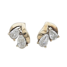 A Pair of 14k Yellow Gold Diamond Stud Earrings