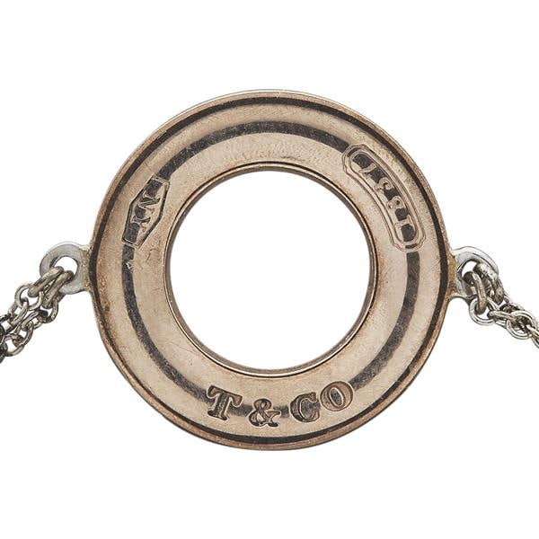 Tiffany & Co. 1837 Sterling Silver and Rubedo Circle Bracelet: METAL: Sterling Silver, Rubedo metal. MEASUREMENTS: Length 6 inches. MARKED: Tiffany & Co, Ag925, T&Co., Metal, 1837, NY. WEIGHT: 1.8 grams.