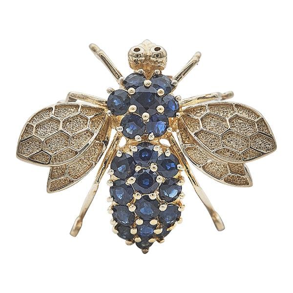 14k Yellow Gold Sapphire Bee Brooch Pin: METAL: 14k Yellow Gold. GEMSTONES: Sapphires. MEASUREMENTS: 26mm x 31mm. MARKED: 14k, 585. WEIGHT: 7.1 grams. Gemstones have not been graded for color and clarity, and tested for clarity and color enh