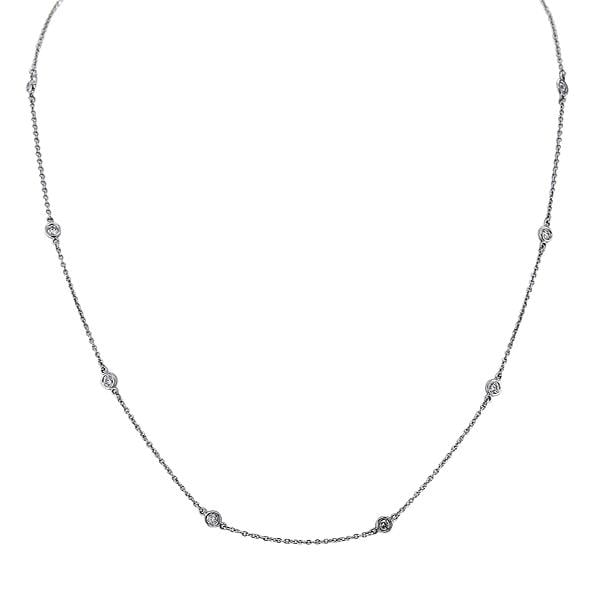 Tiffany & Co. Elsa Peretti Platinum Diamonds by the Yard Station Necklace: 11 Diamonds weighing approx. 0.33 ctw. Necklace length is 16 inches. Signed Tiffany & Co., PT950, Peretti. Comes with box. Gemstones have not been graded for color and clarity, and tested for clar