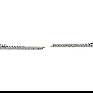 14k Yellow Gold Diamond Tennis Bracelet: Diamonds weighing approx. 3.60 ctw. Bracelet length 7 3/4 inches. Stamped 14K, maker's mark, 2.5. 8.6 grams. Gemstones have not been graded for color and clarity, and tested for clarity and color