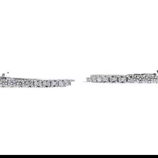 14k White Gold Diamond 9.15 ctw Tennis Bracelet: Diamonds weighing approx. 9.15 ctw are Faint Brown, I-J color, VS-SI clarity. Bracelet length 7 inches. Stamped LB, 14Kt, 9. 15.1 grams. Gemstones have not been graded for color and clarity, and teste