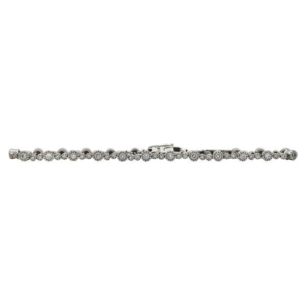14k White Gold Diamond approx. 1.92 ctw Tennis Bracelet: Diamonds weighing approx. 1.92 ctw. Bracelet length 7 3/4 inches. Stamped 14K, 585. 9.8 grams. Gemstones have not been graded for color and clarity, and tested for clarity and color enhancement, unles