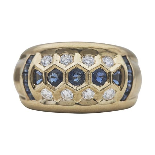 18k Yellow Gold Diamond and Sapphire Honeycomb Ring: Diamonds weighing approx. 0.32 ctw. Ring size 8. Stamped 750, BSW. 8.8 grams. Gemstones have not been graded for color and clarity, and tested for clarity and color enhancement, unless stated otherwis