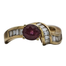 18k Yellow Gold Oval-Shaped Ruby and Baguette-Shaped Diamond Ring