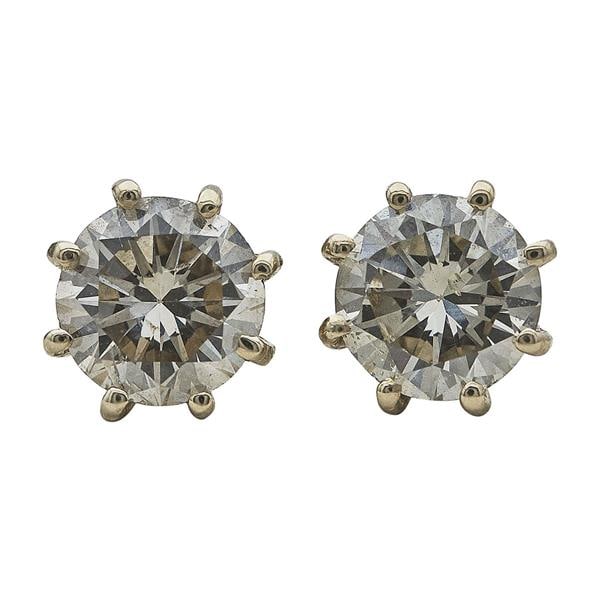 14k Rose Gold Diamond 1.67 ctw 8 Prong Stud Earrings: Diamonds measuring approx. 6.1mm diameter. Diamonds are approx. S-T color, I2 clarity. Stamped 14k. With 14k Gold backs. 1.4 grams. Gemstones have not been graded for color and clarity, and tested for