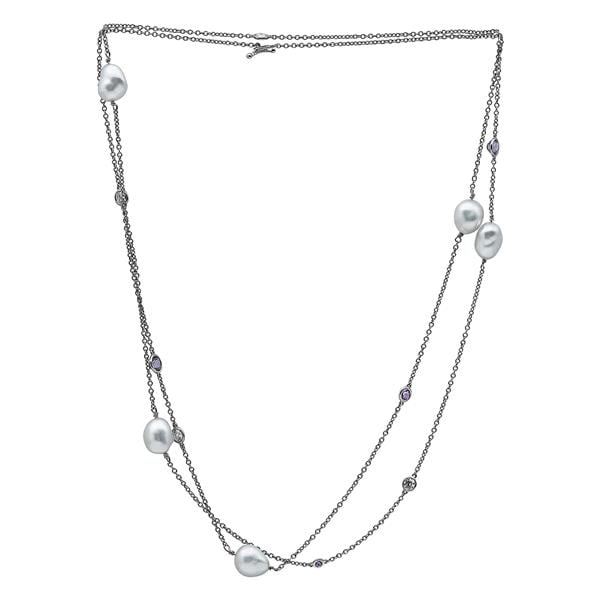 Tiffany & Co. Elsa Peretti Pearls by the Yard Sprinkle Platinum Freshwater Pearl, Pink Sapphire: Diamonds weighing approx. 0.80 ctw. Cultured Freshwater pearls measuring approx. 11mm x 8mm. Necklace length 37 1/2 inches. Stamped T&Co., PT950, Peretti. 15.3 grams. Gemstones have not been grade