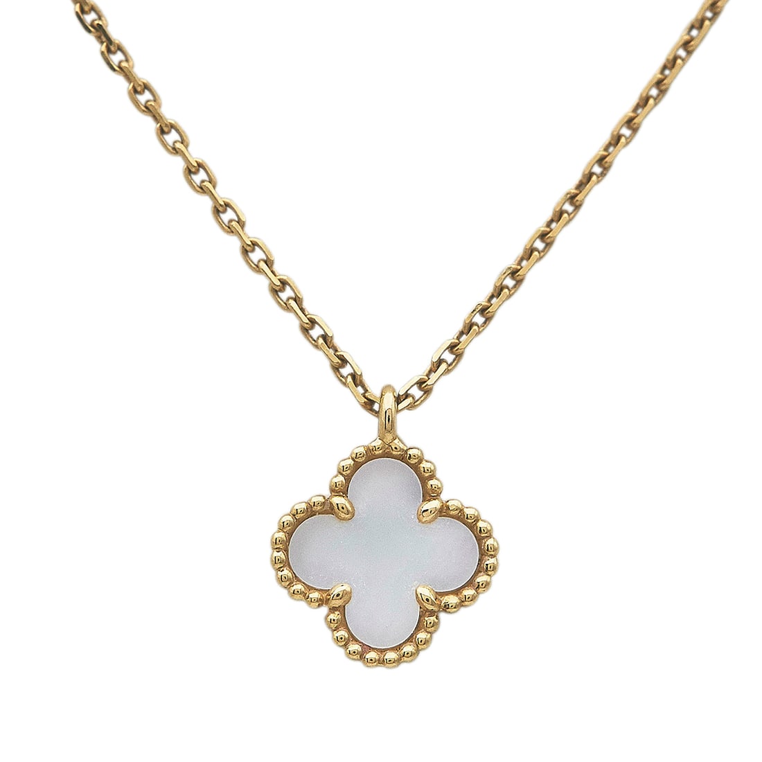 Van Cleef & Arpels Sweet Alhambra 18K Yellow Gold Mother-of-Pearl Pendant Necklace: BRAND: VCA; COLLECTION: Alhambra (Sweet); METAL: 18K Yellow Gold; GEMSTONES: Mother-of-Pearl; STAMPED: VCA, Au750, numbered, assay mark; CONDITION: Pre-owned, Very Good; ITEM WEIGHT (GRAMS): 2.9 g; ME