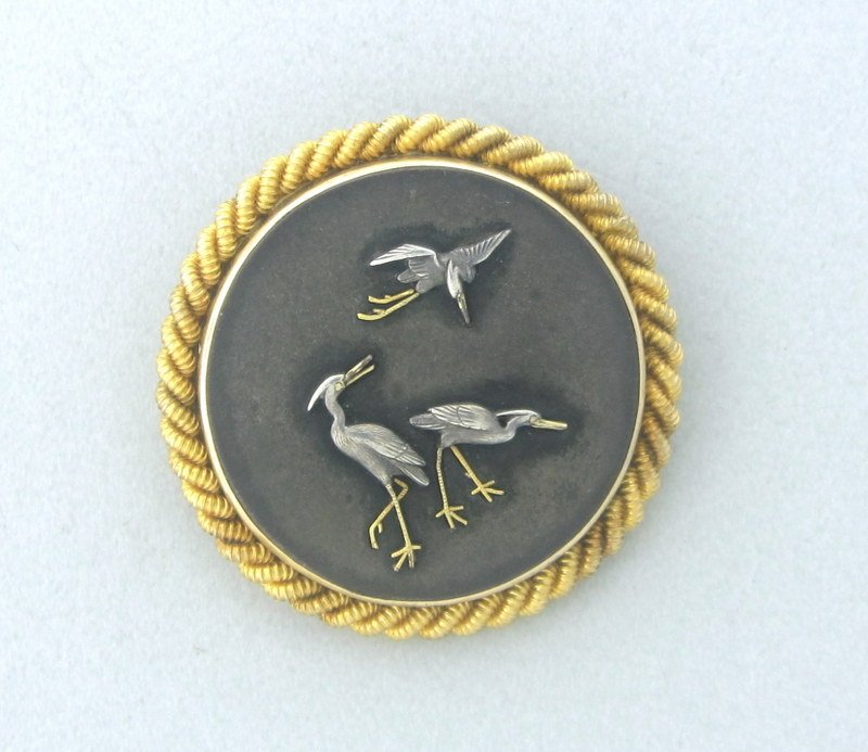 Antique Japanese Shakudo Gold Bird Motif Brooch: Measurements- 30mm diameter,weight- 12.7 gms, shakudo mixed metals center with 14k gold frame, c-me