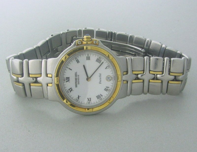 Modern Raymond Weil Parsifal Man's Watch: 34mm case , quartz movement, date window at 6 o'clock, steel and gold case and bracelet original crown. sbinc