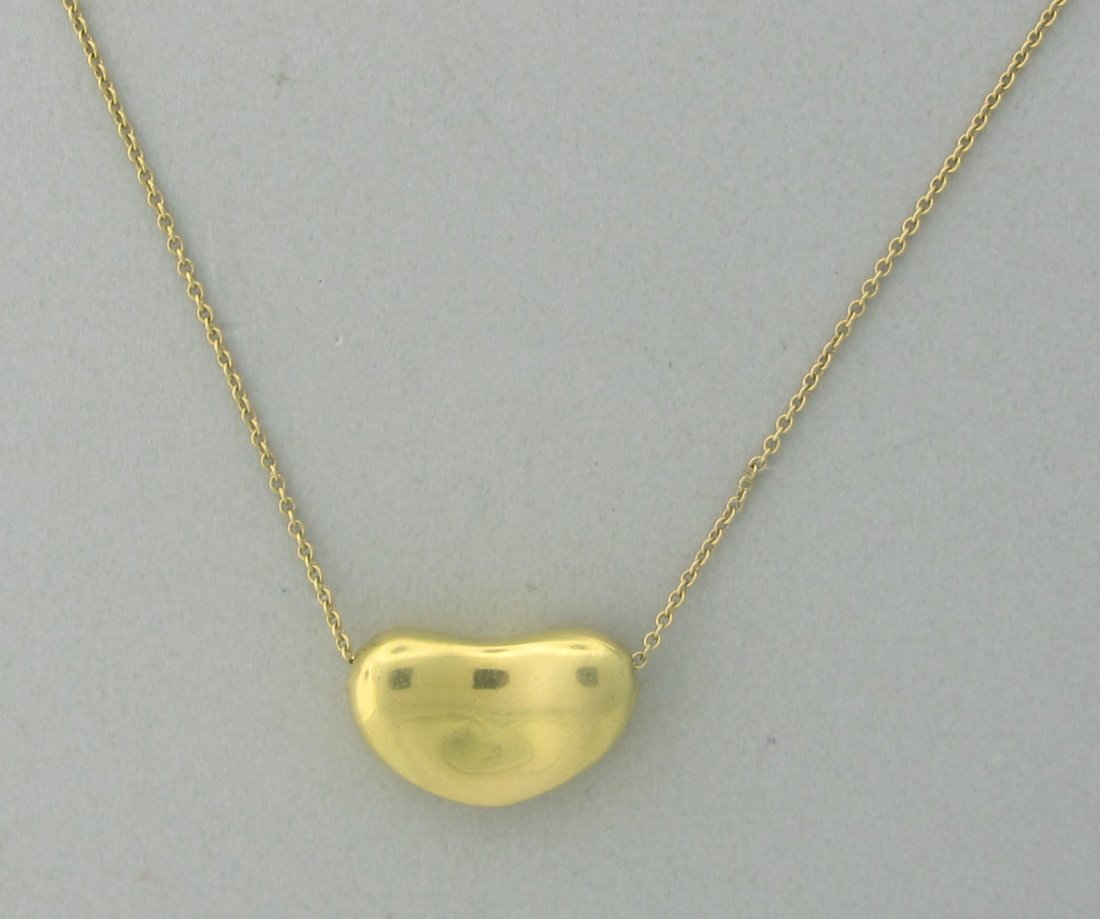 Tiffany & Co Peretti 18k Gold Bean Necklace: Vintage Tiffany & Co. Elsa Peretti 18k gold bean necklace. Measurements - necklace is 19" long. pendant is 18.5mm x 11mm. marks - Tiffany & Co,Elsa Peretti,18k. weight - 11.3 grams. consignor # sasha
