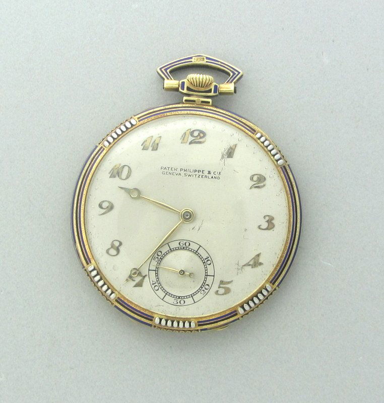 Rare Vintage Patek Philippe 18k Gold Pocket Watch: 18k yellow gold case #412379, beautifully engraved Art Deco design with black enamel accents (43mm diameter), Manual wind movement 18 jewels with 8 adjustments movement #812746.. Triple signed. sbinc