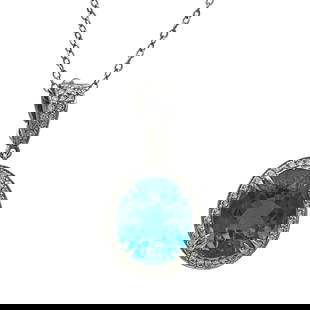 Platinum Tourmaline and Diamond Halo Pendant Necklace: METAL: Platinum; APPROXIMATE TOTAL DIAMOND WEIGHT: 0.48 ctw; GEMSTONES: Tourmaline weighing approx. 3.50 carats; STAMPED: Plat; CONDITION: Pre-owned, Very Good; ITEM WEIGHT (GRAMS): 5.4 g;
