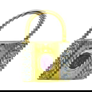 14K Yellow Gold Ruby and Diamond Padlock Pendant Charm: METAL: 14K Yellow Gold; APPROXIMATE TOTAL DIAMOND WEIGHT: 0.30 ctw; GEMSTONES: Ruby weighing approx. 0.18 carat; STAMPED: 585, 14K; CONDITION: Pre-owned, Very Good; ITEM WEIGHT (GRAMS): 3 g;