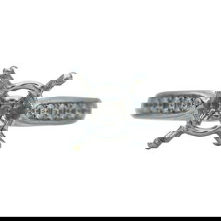 18K White Gold Diamond Engagement Ring Setting: METAL: 18K White Gold; APPROXIMATE TOTAL DIAMOND WEIGHT: 0.50 ctw; STAMPED: 750, 1D3.02; CONDITION: Pre-owned, Very Good; ITEM WEIGHT (GRAMS): 4.1 g; MEASUREMENTS: Ring size 6 1/4; center will fit