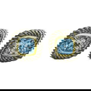 David Yurman Cable 14K/18K Yellow Gold and Sterling Silver Blue Topaz Stud Earrings: BRAND: David Yurman; COLLECTION: Cable; METAL: 14K Yellow Gold/18K Yellow Gold, Sterling Silver; GEMSTONES: Blue Topaz weighing approx. 2.50 ctw; STAMPED: D. Yurman, 750, 925, 585; CONDITION: Pre-owne