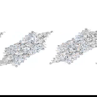 18K White Gold Diamond Flower Cluster Earrings: METAL: 18K White Gold; APPROXIMATE TOTAL DIAMOND WEIGHT: 1.50 ctw; TESTED: 18K White Gold; CONDITION: Pre-owned, Very Good; ITEM WEIGHT (GRAMS): 4 g; MEASUREMENTS: 10mm x 11mm; ADDITIONAL COMMENTS: Wi