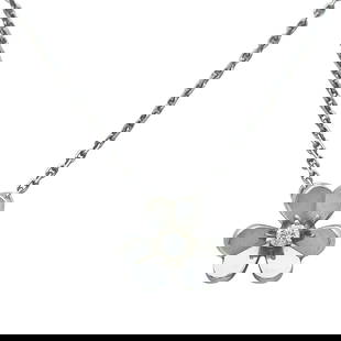 Van Cleef & Arpels Frivole 18K White Gold Diamond Mini Model Pendant Necklace: BRAND: VCA; COLLECTION: Frivole; METAL: 18K White Gold; APPROXIMATE TOTAL DIAMOND WEIGHT: 0.05 ctw; STAMPED: VCA, Au750, numbered, assay mark; CONDITION: Pre-owned, Very Good; ITEM WEIGHT (GRAMS): 3.3